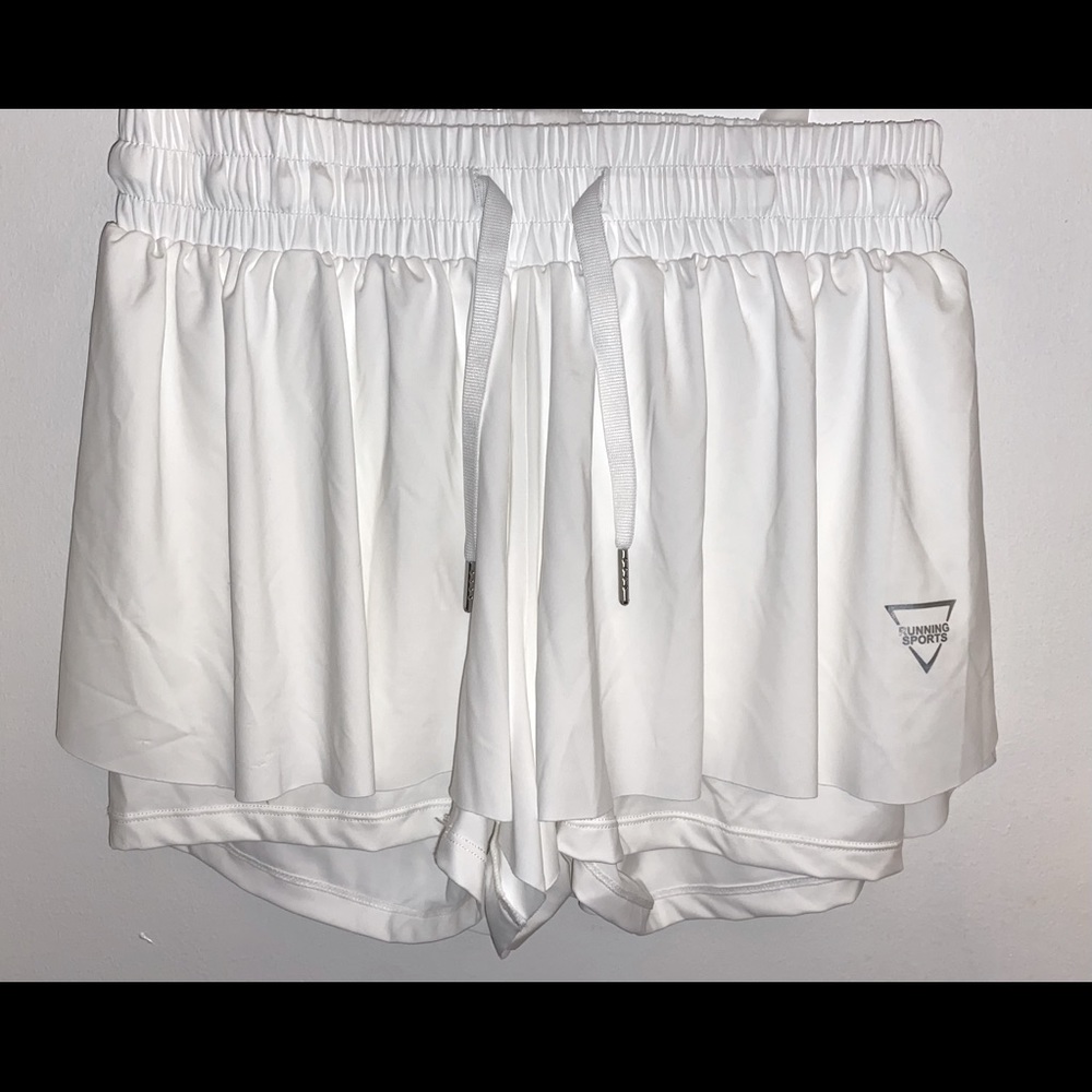 White athletic 2 in 1 flowy shorts